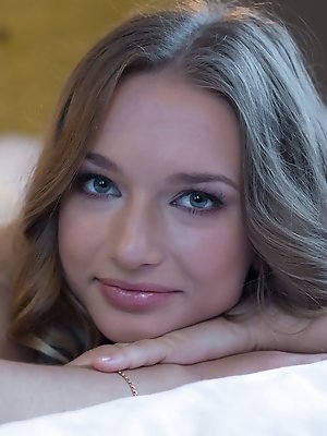 Amyy's inviting body gestures evokes an ambience of romance and sensual allure. pics ~ SexyNakedModels.com